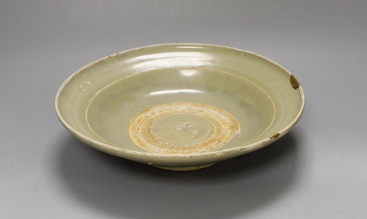 A Chinese celadon dish, Yuan dynasty, 27cm